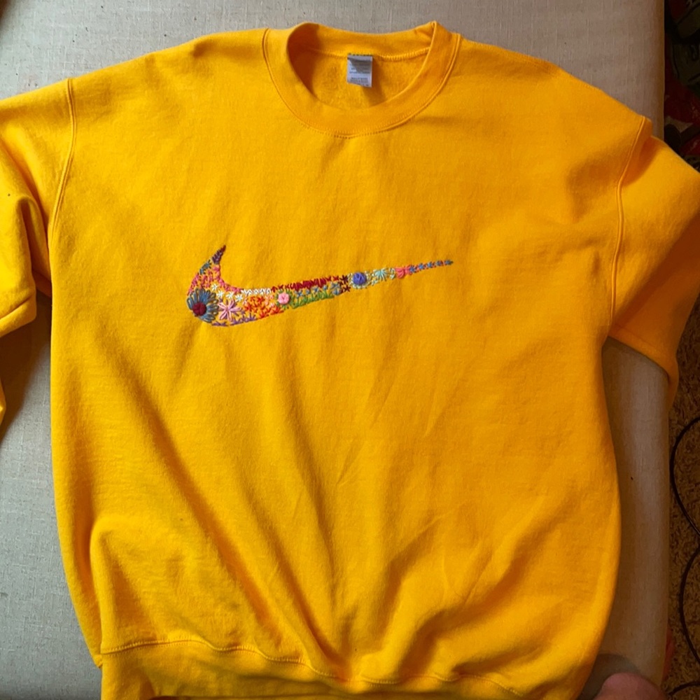 Bright yellow, embroidered bike sweatshirt